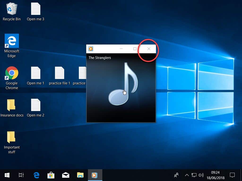 Close button (X) indicated on windows media player window.