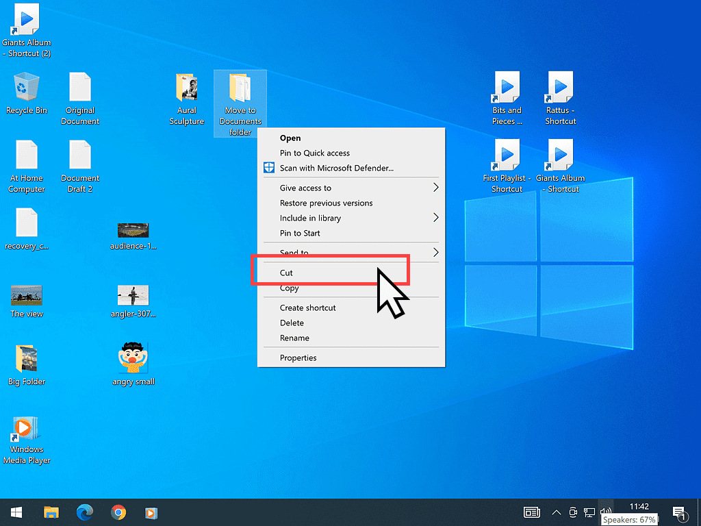 In Windows 10, the options menu is open and the command Cut is highlighted.