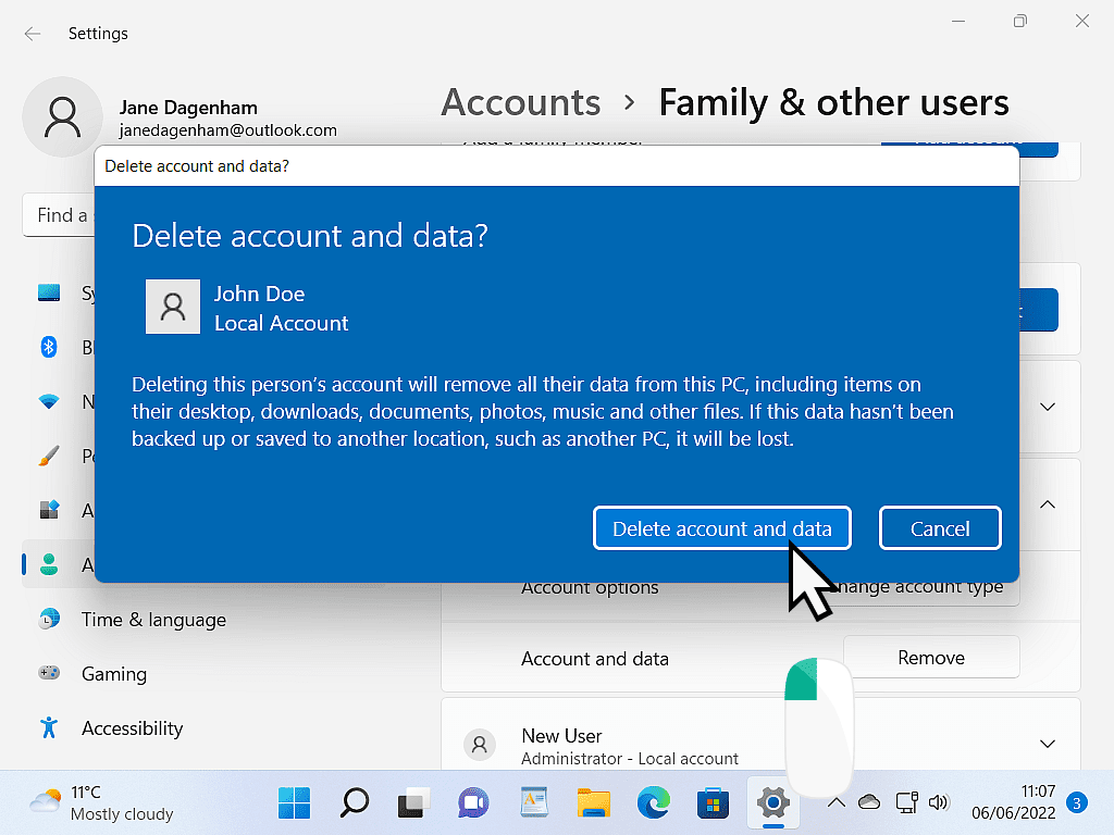 Delete account and data confirmation window in Windows 11. The delete button is indicated.