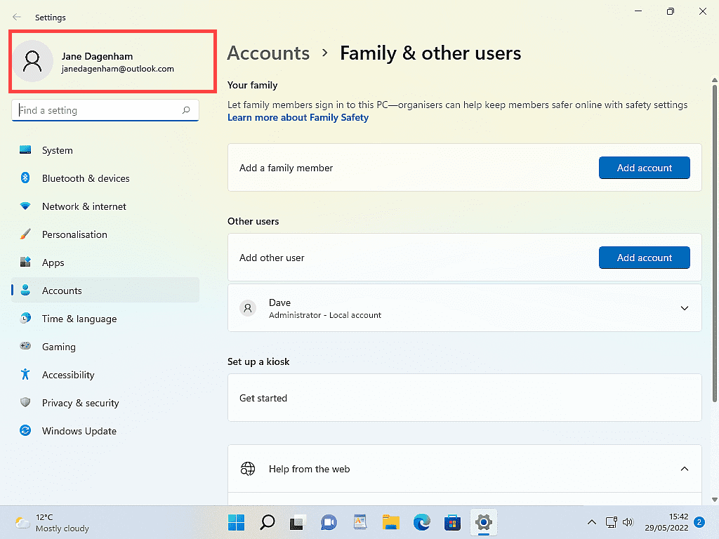 Windows 11 accounts page with Microsoft account indicated.