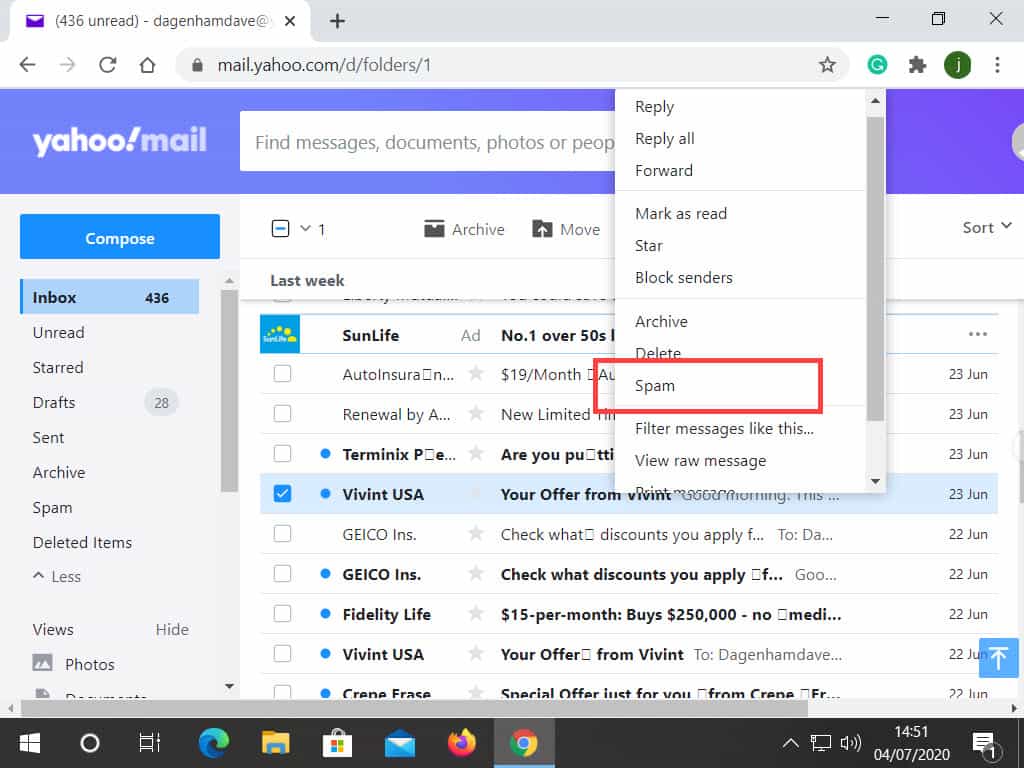 Options menu open in Yahoo Mail. Spam option is indicated.