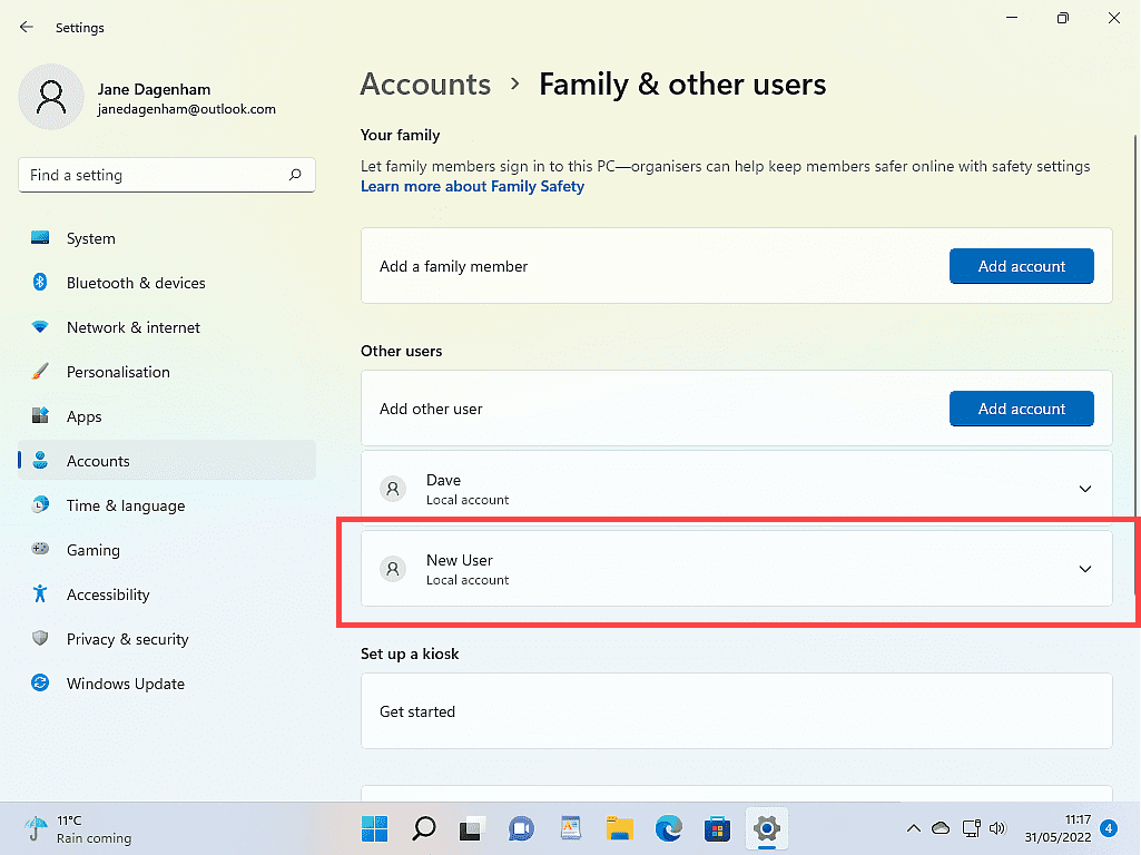 The new account is marked in Windows 11.