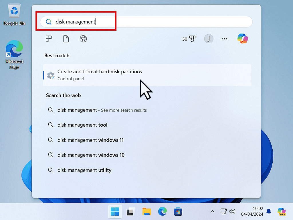 Disk Management is type into search box in Windows 11.