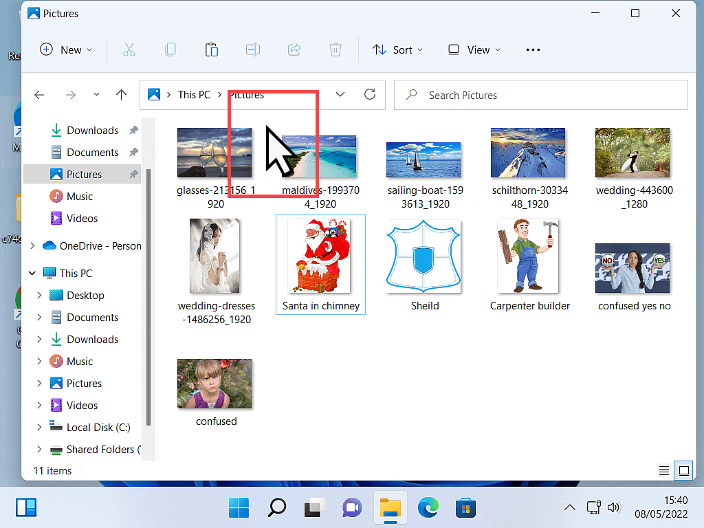 Pictures folder open and pointer is marked in 