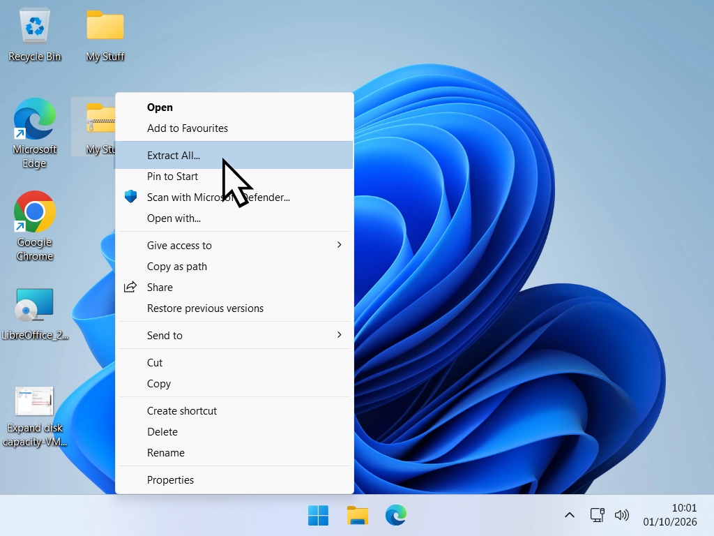 Right-click menu on a downloaded zip file with Extract All highlighted.