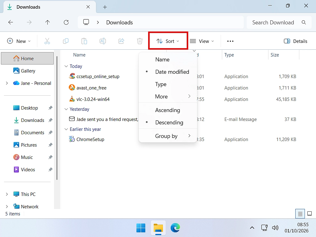 Sorting the Downloads folder by Date modified to find the newest download.