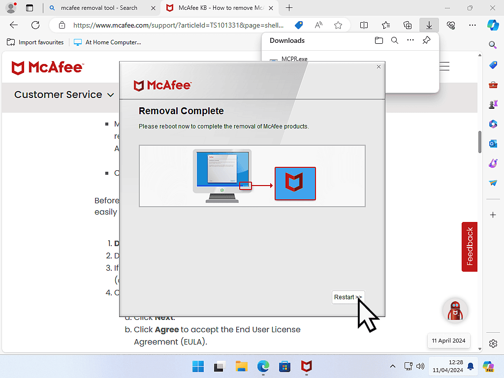 McAfee has been uninstalled from computer. The Restart button is highlighted.