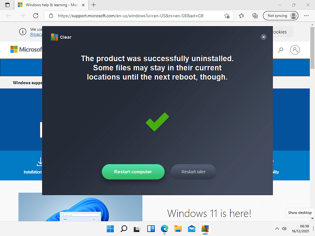 AVG has been successfully removed. Restart Computer button indicated.