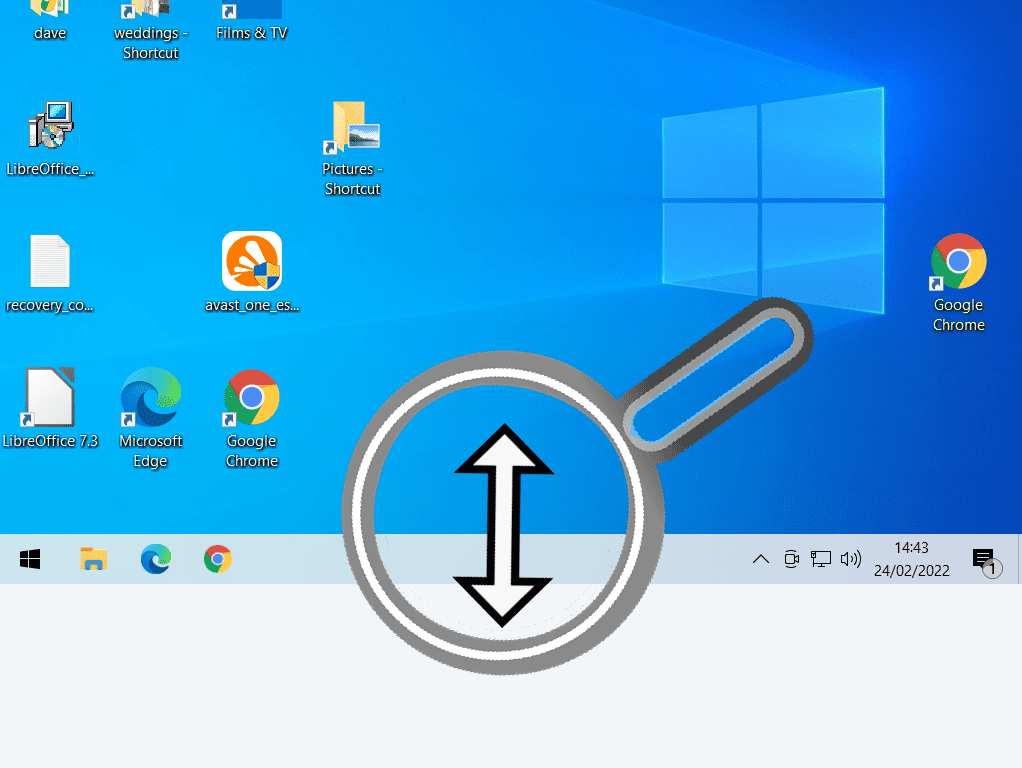 Double headed arrow is magnified on the taskbar.
