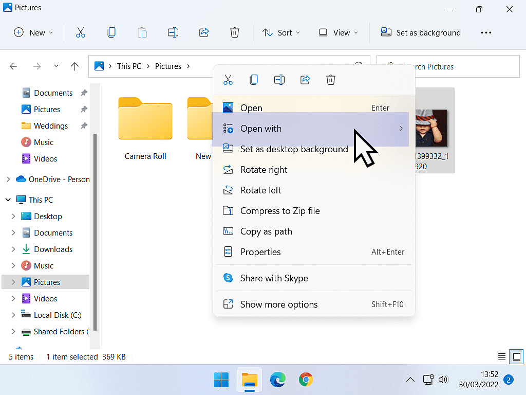 On the right click options menu, Open With is highlighted