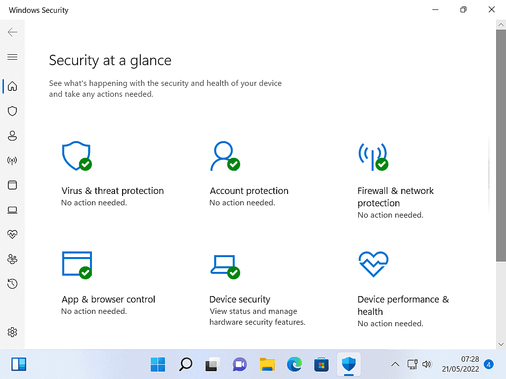 Windows Security is open at the "Security at a glance" page.