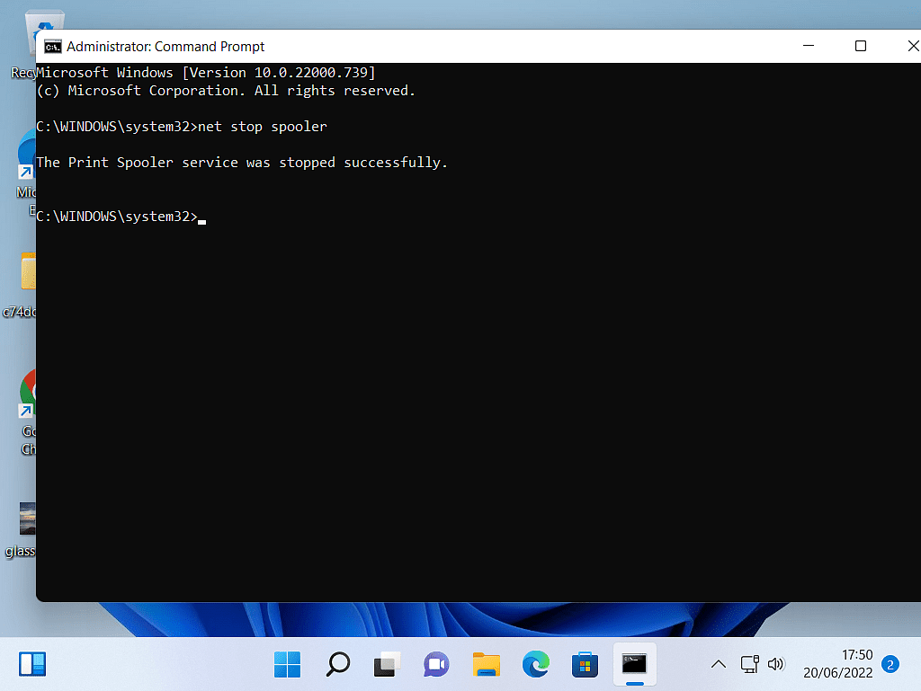 Command Prompt window. Message reads "The Print Spooler service was stopped successfully”.