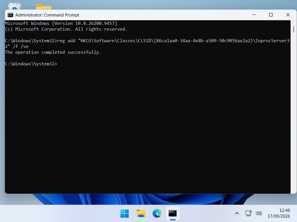 Command Prompt showing the reg add command and the message The operation completed successfully.