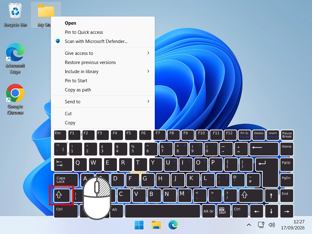 Holding Shift and right clicking a file in Windows 11 to open the old context menu.