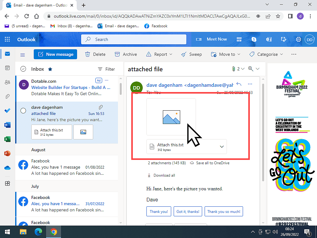 Outlook.com webmail open. A mouse pointer is hovering over an email attachment.