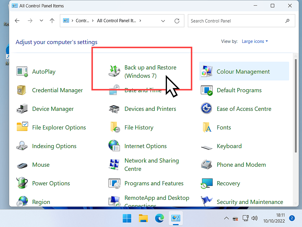 Windows 11 Control Panel open in Large Icons view. Backup and Restore (Windows 7) is marked.