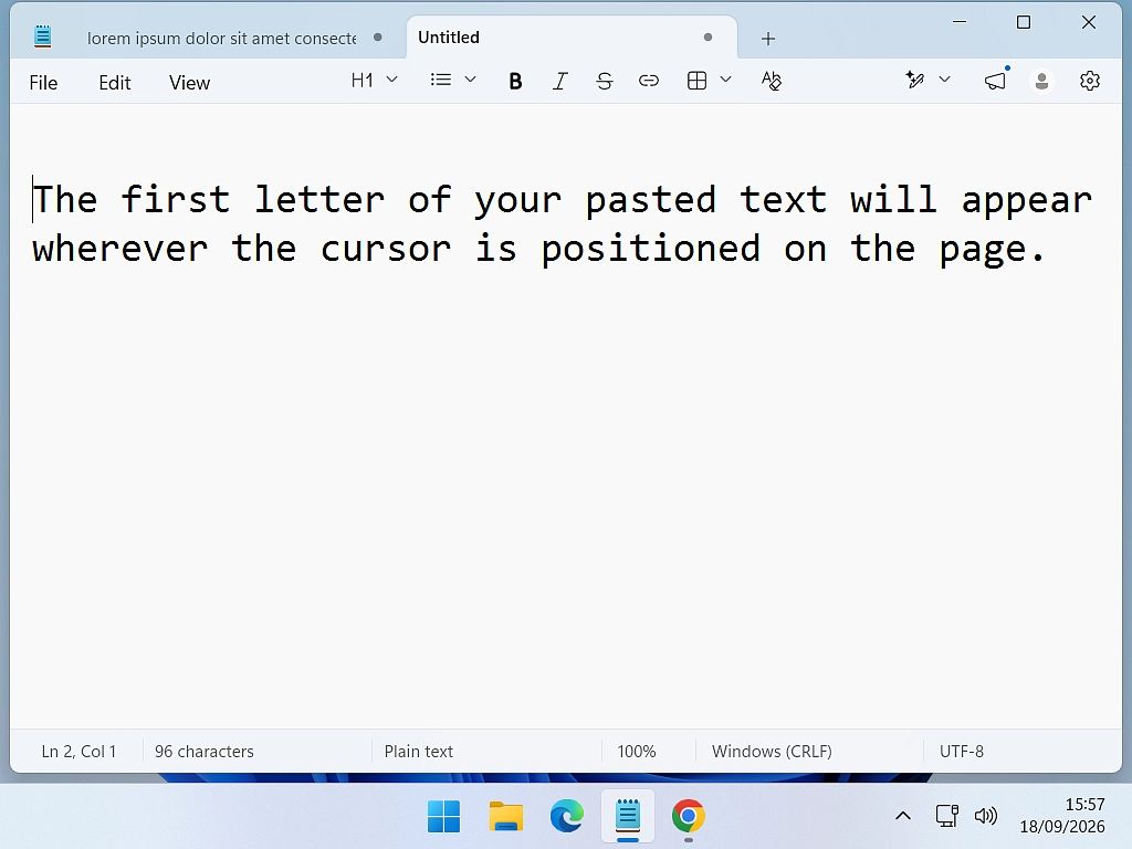 Text being pasted into a document next to the flashing cursor which is highlighted