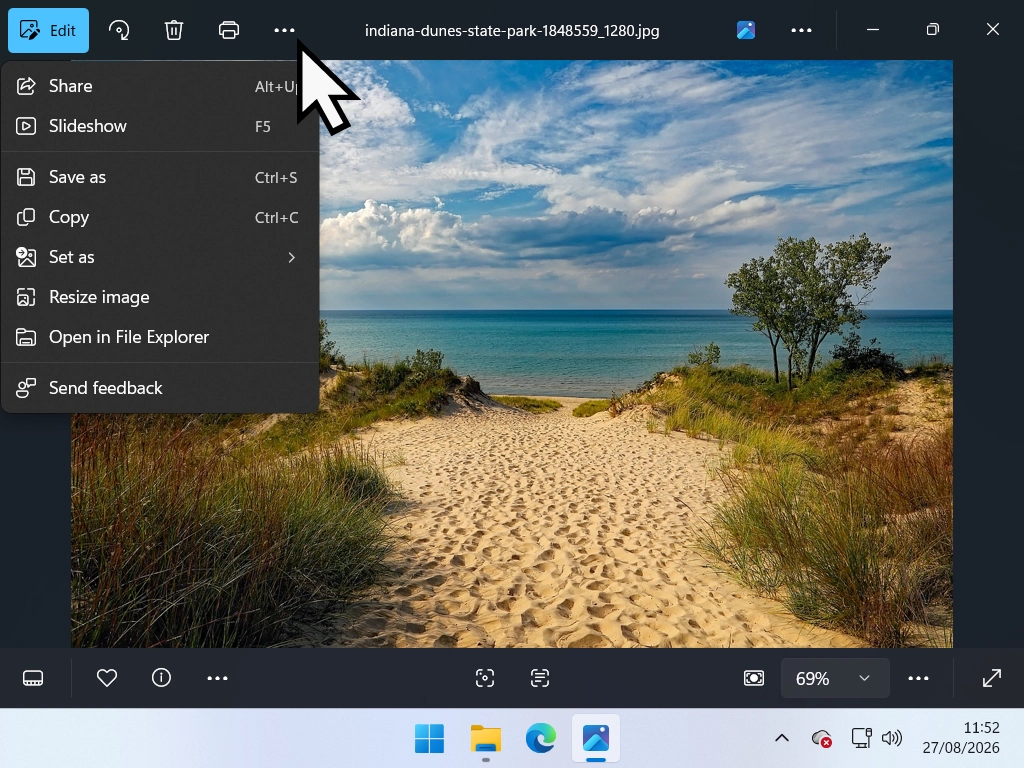 No way to save file The Windows Photos app with no visible File menu. Click the 3 dots and the menu appears.