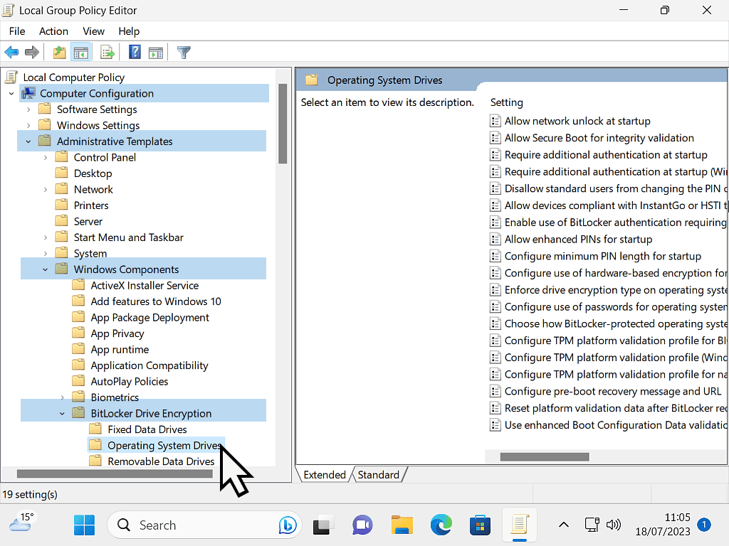 Operating system drives folder highlighted in the Group Policy Editor.