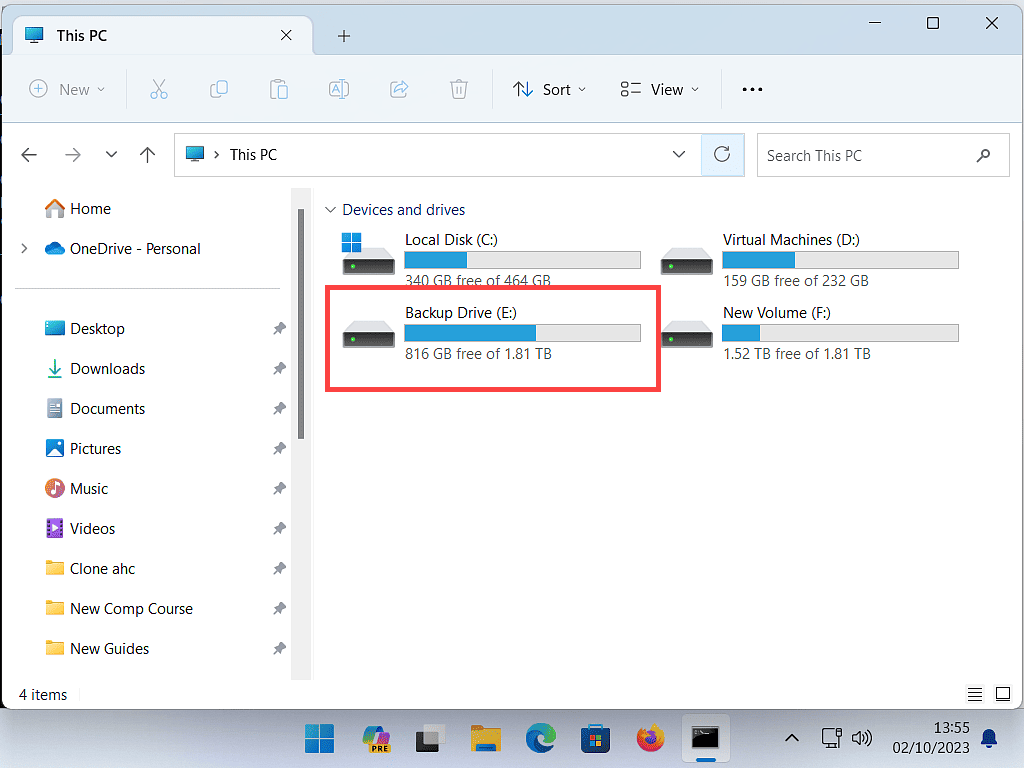In File Explorer, a backup drive with letter E: is highlighted.