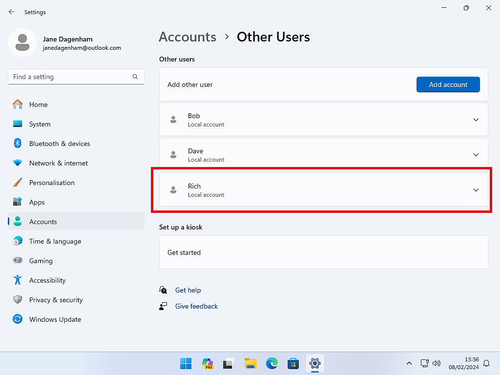 The new user account is highlighted in Windows 11.
