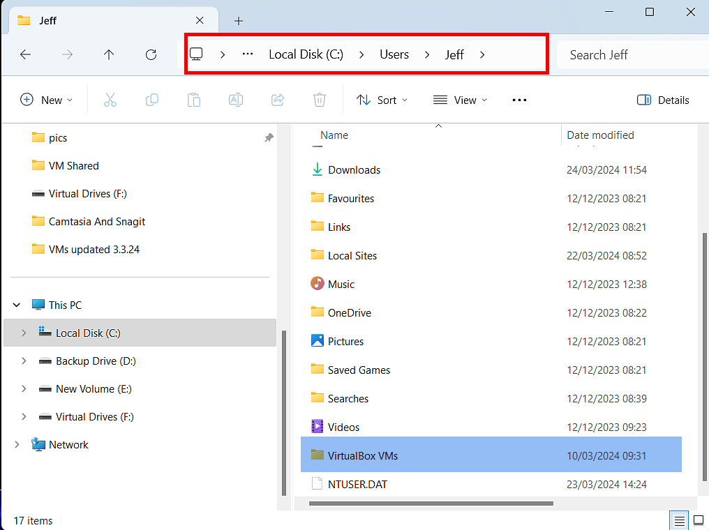 VirtualBox VM folder highlighted in File Explorer.