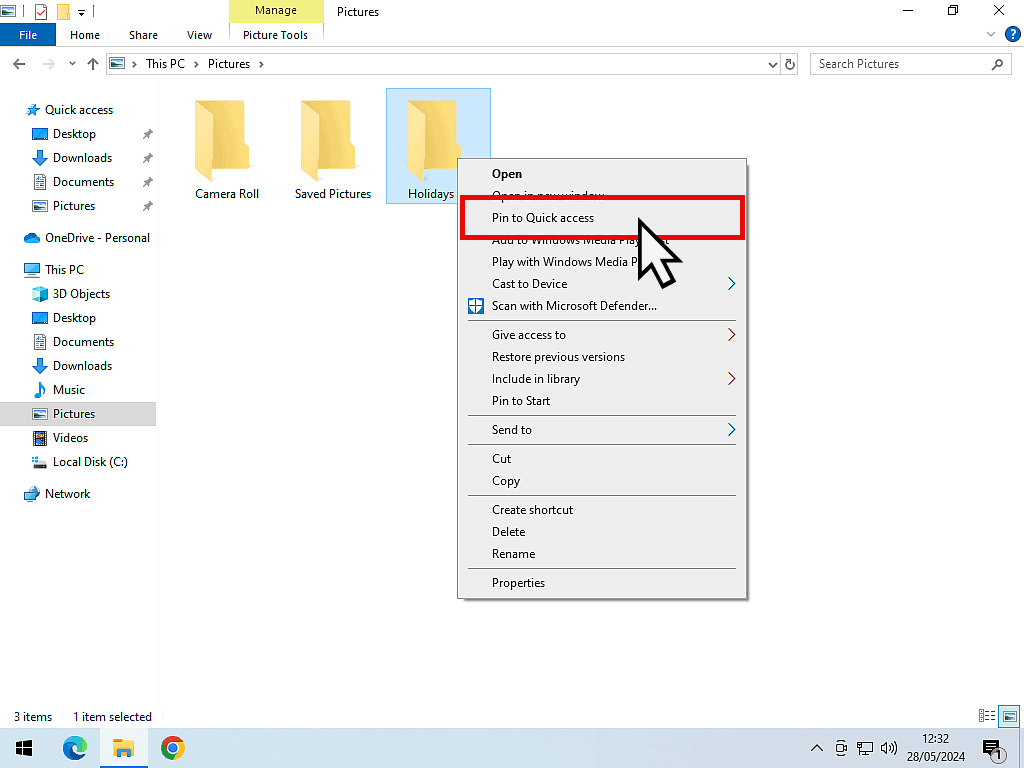Context menu is open and Pin to Quick Access is being clicked in Windows 10.