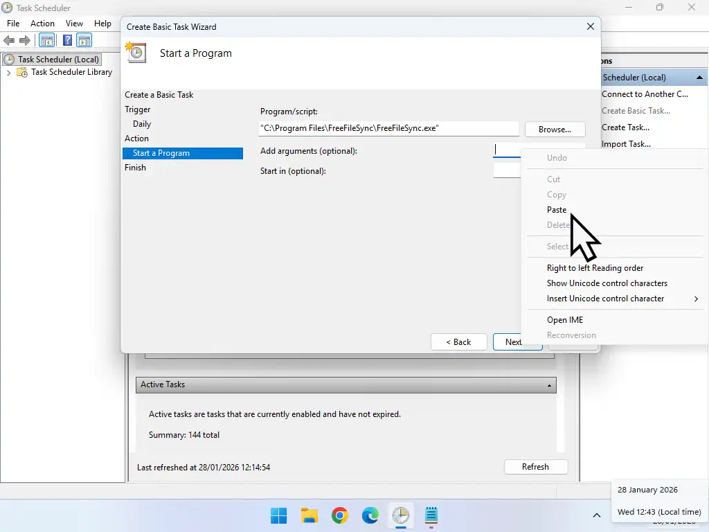 Adding batch file to Add Arguments Pasting the path to the batch file into the Arguments box in Task Scheduler.
