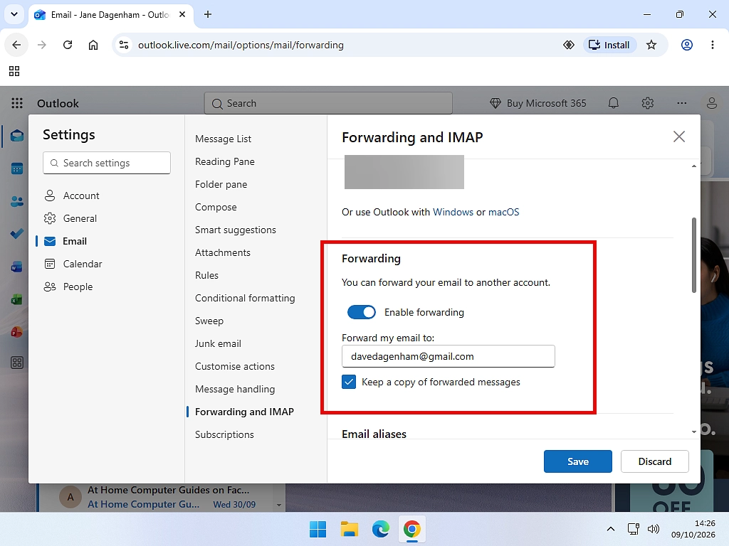 The Forwarding page in Outlook.com settings with Enable forwarding turned on and a Gmail address entered.